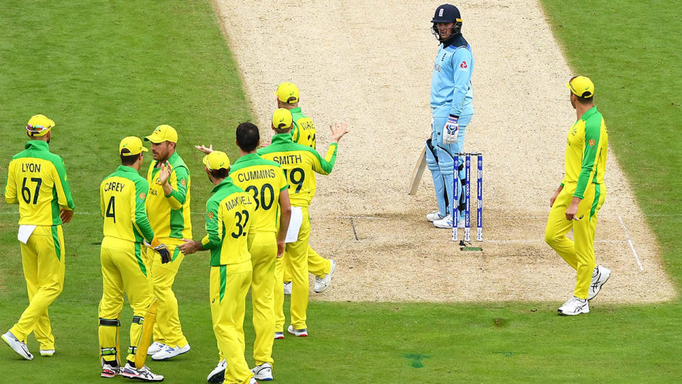 Australian players react as Jason Roy remonstrates with umpires over the awful call. (Photo by Clive Mason/Getty Images)