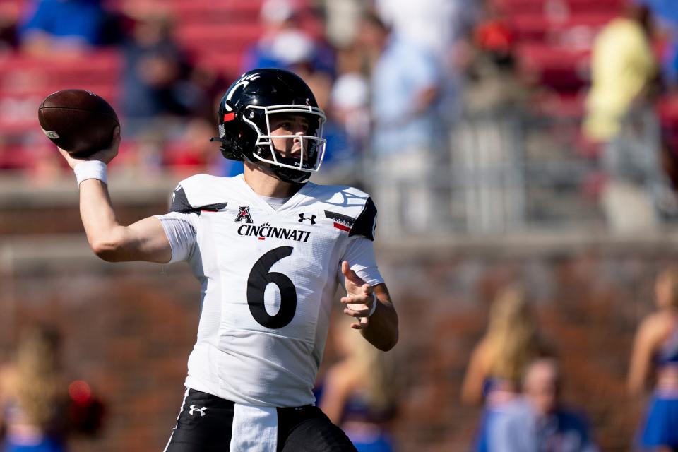 Cincinnati Bearcats quarterback Ben Bryant (6) throws a pass in the first quarter of the American Athletic Conference game between the Cincinnati Bearcats and the Southern Methodist Mustangs at Gerald J. Ford Stadium in Dallas on Saturday, Oct. 22, 2022.