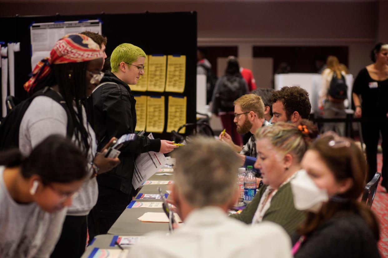 COLUMBUS, OH - NOVEMBER 08: Voters sign in to cast their ballots at the Ohio Union at The Ohio State University on November 8, 2022 in Columbus, Ohio. After months of candidates campaigning, Americans are voting in the midterm elections to decide close races across the nation. (Photo by Andrew Spear/Getty Images) ORG XMIT: 775897883 ORIG FILE ID: 1244615189