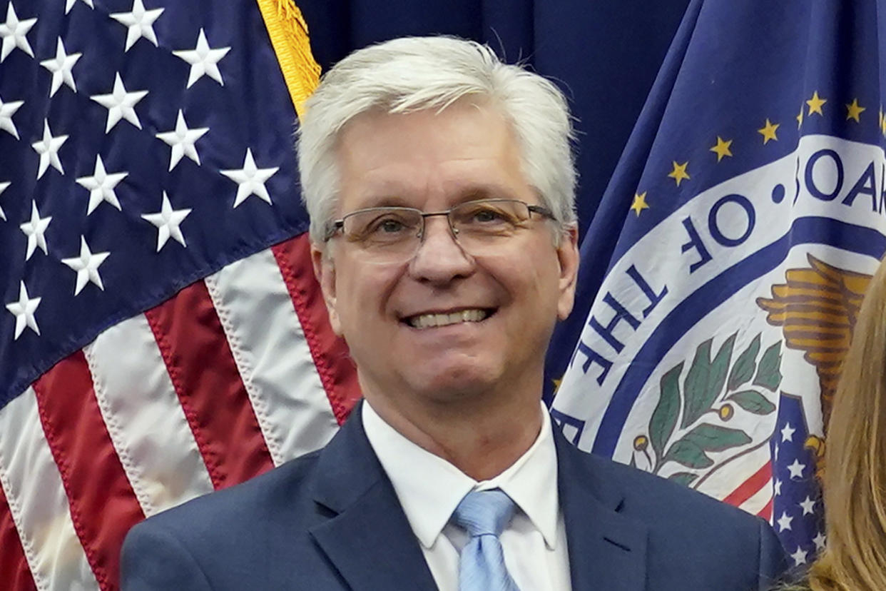 Federal Reserve Board of Governors member Christopher Waller poses for a photo on May 23, 2022, in Washington. Waller, a key Federal Reserve official, added his voice Wednesday, Nov. 16, to a rising number of Fed officials who have suggested that the central bank will likely slow the pace of its interest rate hikes beginning in December. (AP Photo/Patrick Semansky, File)