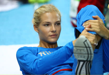 2016 Rio Olympics - Athletics - Preliminary - Women's Long Jump Qualifying Round - Groups - Olympic Stadium - Rio de Janeiro, Brazil - 16/08/2016. Darya Klishina (RUS) of Russia reacts before the competition starts. REUTERS/Kai Pfaffenbach