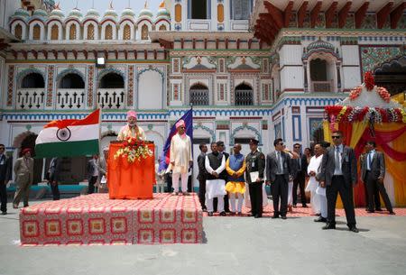 India's Prime Minister Narendra Modi speaks with the media as Nepal's Prime Minister Khadga Prasad Sharma Oli, also known as K.P. Oli, stands next to him during his visit at Janaki Mandir, a Hindu temple dedicated to goddess Sita, in Janakpur, Nepal May 11, 2018. REUTERS/Navesh Chitrakar