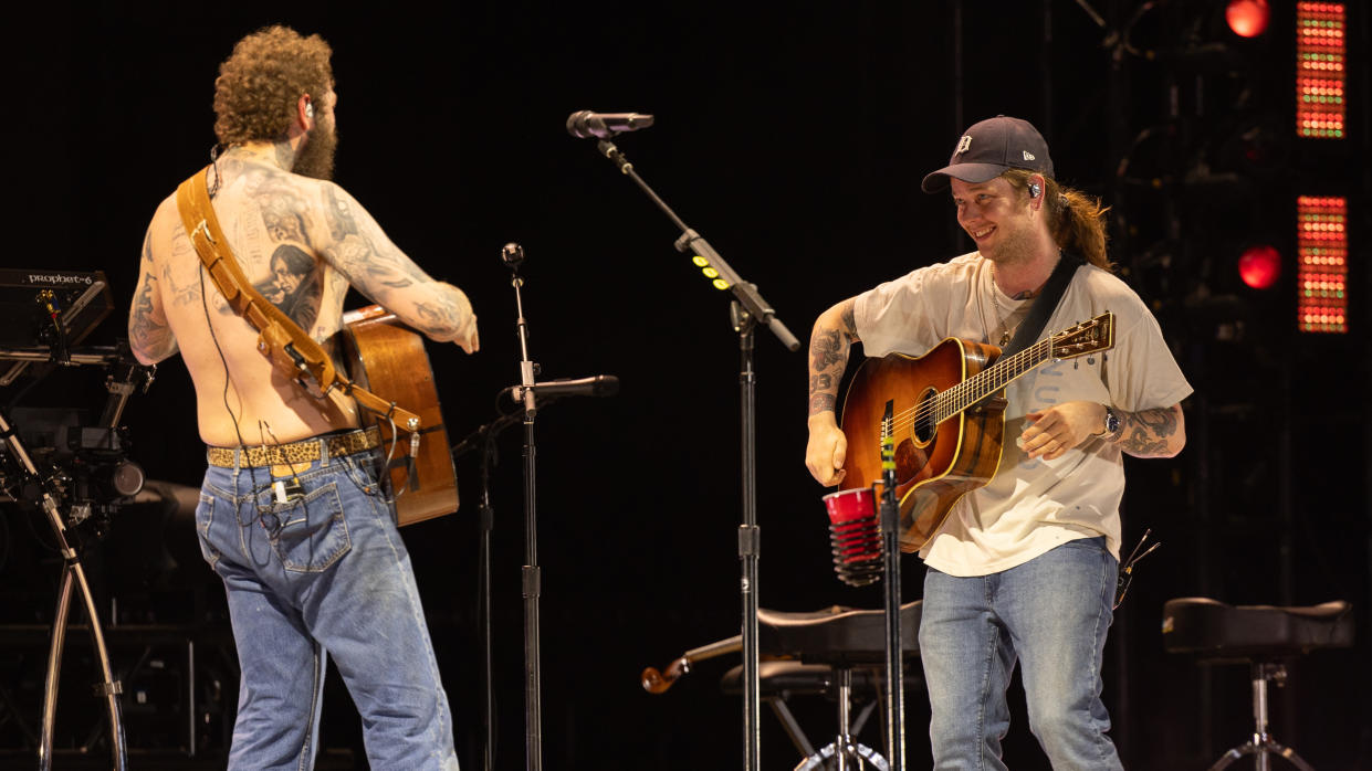  (L-R) Post Malone and Billy Strings perform during the 2024 Bonnaroo Music and Arts Festival on June 14, 2024 in Manchester, Tennessee. 