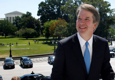 FILE PHOTO: With the U.S. Supreme Court building in the background, Supreme Court nominee judge Brett Kavanaugh arrives prior to meeting with Senate Majority Leader Mitch McConnell on Capitol Hill in Washington, U.S., July 10, 2018. REUTERS/Joshua Roberts/File Photo