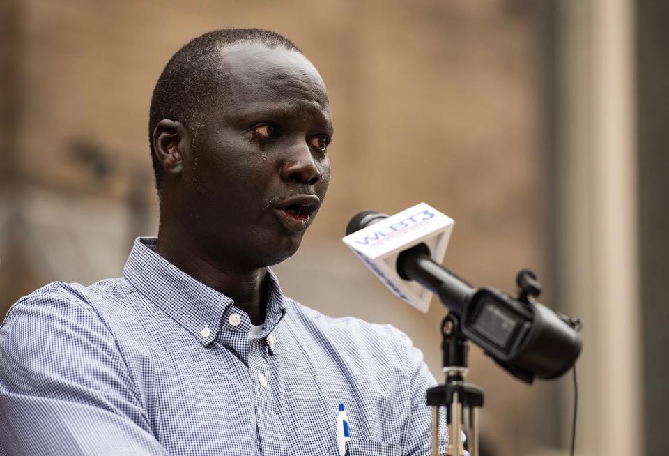 Bul Mabil cries as he speaks about his brother, Dau Mabil, during a press conference to ask for the public's help in finding Dau at St. Andrew's Episcopal Cathedral in Jackson on April 1, 2024. "Please help Dau to come home," Bul said, asking the public to send in any information they might have.