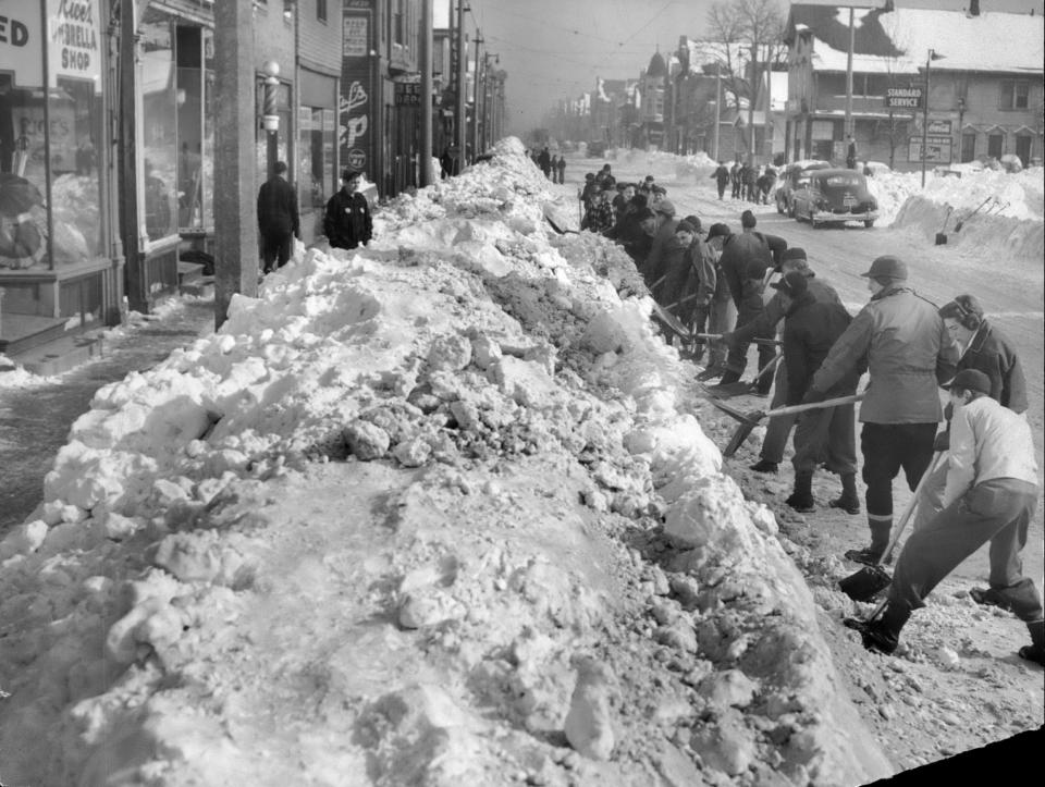 In many places, the "human snowplow" was the only way to clear Milwaukee's tightly packed streets after the January 1947 blizzard. This was near North 18th and West Vliet streets. Eventually, 4,000 people were shoveling or driving plows to clear out the city's streets.