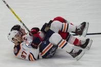 Feb 28, 2019; Ottawa, Ontario, CAN; Edmonton Oilers center Connor McDavid (97) and Ottawa Senators center Jean-Gabriel Pageau (44) fall to the ice in the third period at the Canadian Tire Centre. Mandatory Credit: Marc DesRosiers-USA TODAY Sports