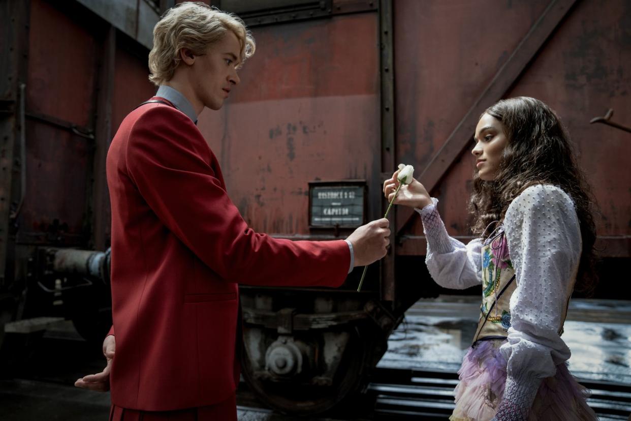 tom blyth as coriolanus snow and rachel zegler as lucy gray baird in the hunger games the ballad of songbirds and snakes photo credit murray close