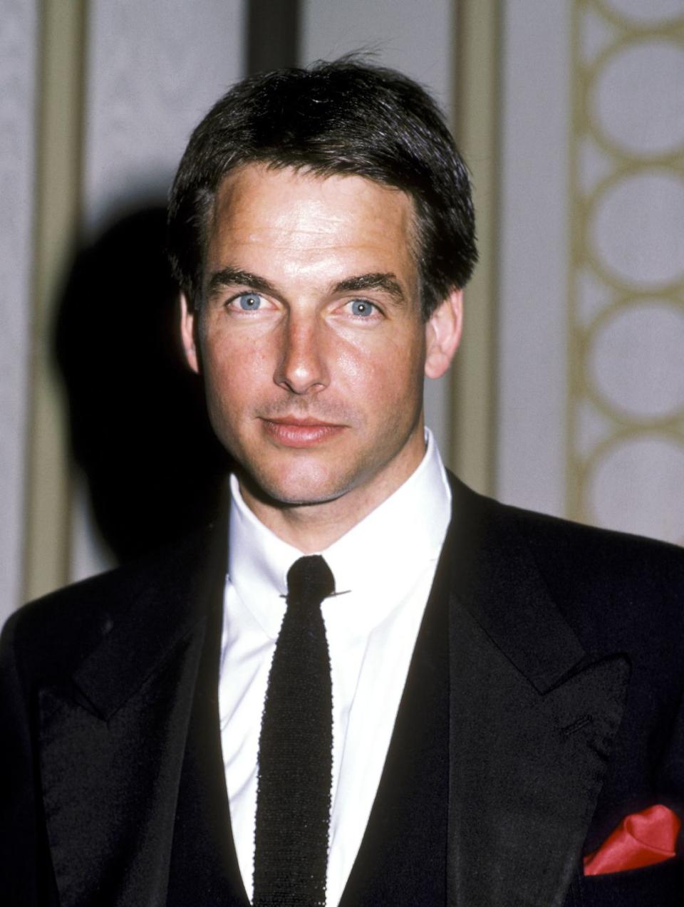 <p>Before he starred on <em>NCIS,</em> Harmon was an '80s heartthrob with dark brown hair. The actor was even voted as <a href="https://people.com/celebrity/mark-harmon-peoples-sexiest-man-alive-1986/" rel="nofollow noopener" target="_blank" data-ylk="slk:People's Sexiest Man Alive in 1986;elm:context_link;itc:0;sec:content-canvas" class="link "><em>People</em>'s Sexiest Man Alive in 1986</a>. </p>