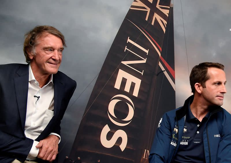 FILE PHOTO: Ratcliffe, CEO of British petrochemicals company INEOS poses for a photograph with British Olympic sailor Ainslie, during a news conference to announce the launch of a British America's Cup sailing team in London, Britain