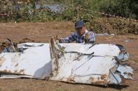 October 16, 2013 - Lao Airlines Flight 301 was on its second landing attempt amidst poor weather from Typhoon Nari when it crashed into the Mekong River in Laos, killing all 44 passengers and five crew members. An investigation released in November 2014, found the pilot had attempted the second landing at too low of an altitude causing the plane to crash. REUTERS/Chaiwat Subprasom