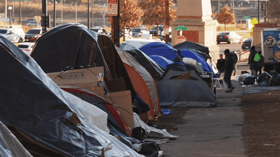 Encampments like these have popped up across Denver where migrants, including some who have timed out of the shelter system, face below freezing temperatures at night. (NBC News)