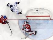 Ice Hockey - Pyeongchang 2018 Winter Olympics - Men's Quarterfinal Match - Czech Republic v U.S. - Gangneung Hockey Centre, Gangneung, South Korea - February 21, 2018 - Jim Slater of U.S. celebrates his second period goal past goalie Pavel Francouz of the Czech Republic. REUTERS/Brian Snyder