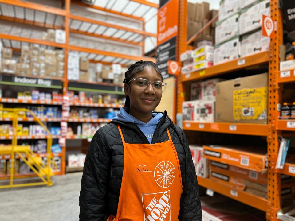Home Depot employee Kayla Grey works a shift at the company's Capitol Drive location.