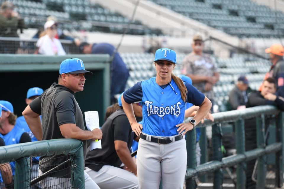 Rachel Balkovec, right, observes the field in her first game as the Tarpons manager.