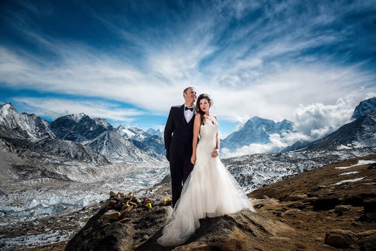 James Sissom and Ashley Schmieder took their vows at Mount Everest base camp wearing a tux and wedding dress. (Photo: Charleton Churchill/Caters News)