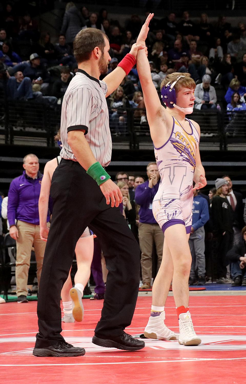 Watertown junior Sloan Johannsen has his arm raised after winning the Class A 120-pound championship on Saturday, Feb. 24, 2023 in the South Dakota State Wrestling Championships at The Monument in Rapid City.