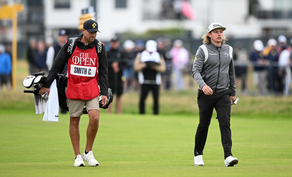 Cameron Smith walks with his caddie