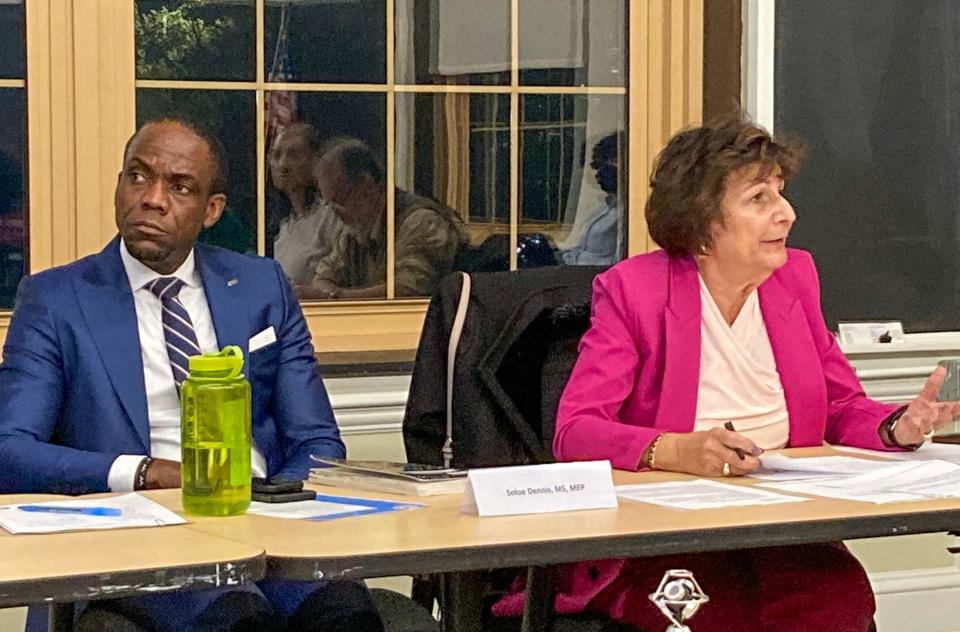 Worcester Director of Public Health Soloe Dennis, seated next to Dr. Matilde Castiel, commissioner of Health and Human Services.