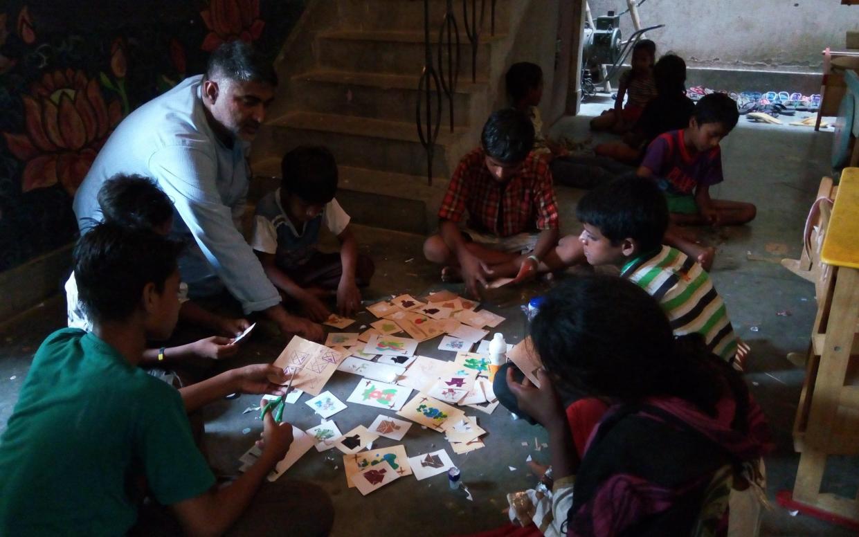 Ajeet Singh, director of Guria India with some of the rescued children