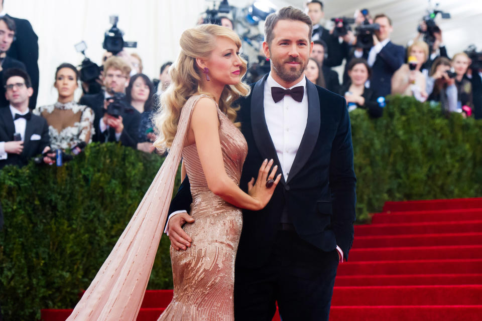 Blake Lively and Ryan Reynolds attend The Metropolitan Museum of Art's Costume Institute benefit gala celebrating "Charles James: Beyond Fashion" on Monday, May 5, 2014, in New York. (Photo by Charles Sykes/Invision/AP)