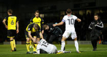 Soccer Football - Championship - Burton Albion vs Sheffield United - Pirelli Stadium, Burton, Britain - November 17, 2017 Sheffield United's Paul Coutts receives medical attention Action Images/Carl Recine