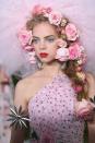 <p>For hairstylist Odile Gilbert, Rodarte's hair look was all about romance. That meant models walked the runway wearing pounds of fresh flowers knotted, tied, and woven throughout their hair. Bows and metallic starburst accessories added a little of Rodartae's subversive and feminine edge back to the look.</p>