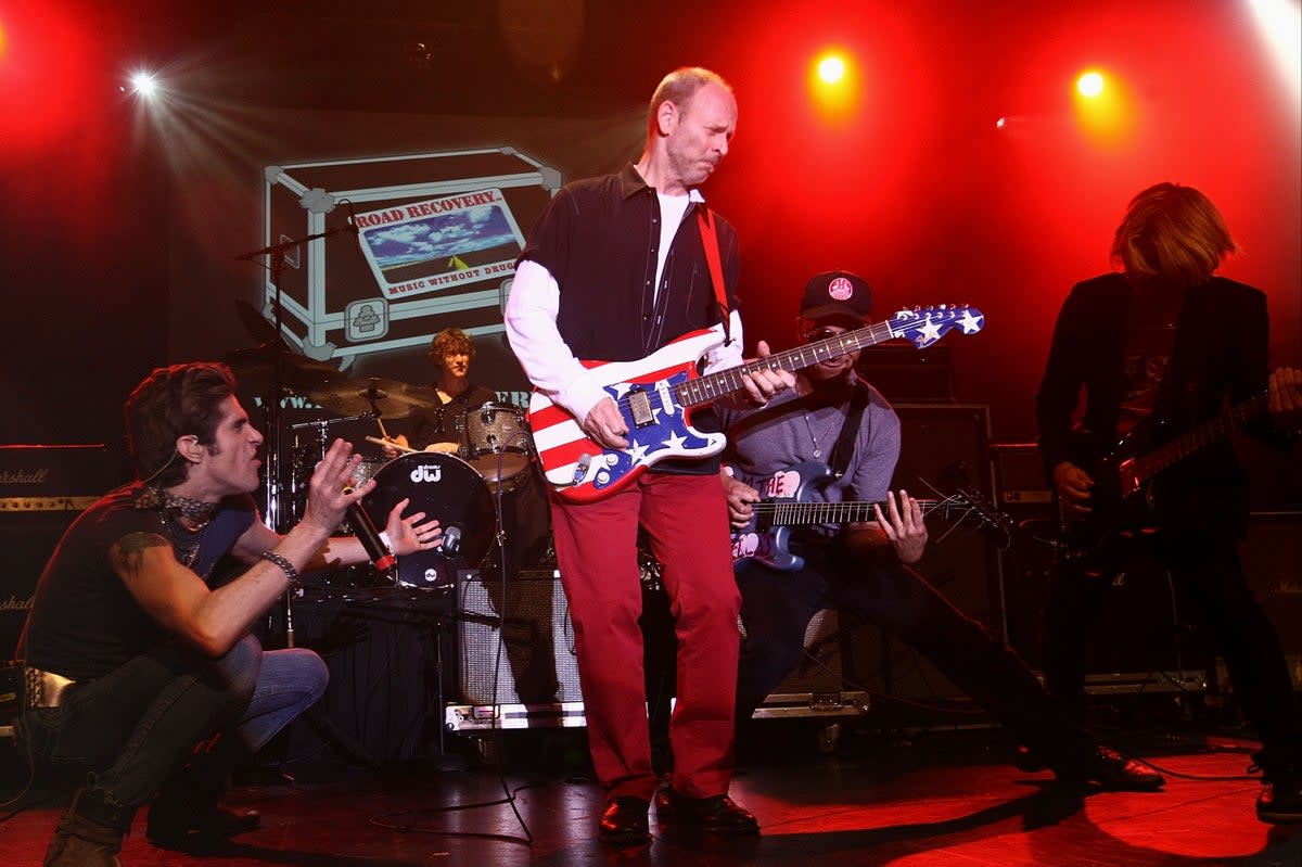 Wayne Kramer onstage in New York in 2009, surrounded by Perry Farrell, Tom Morello and Carl Restivo (Michael Loccisano/Getty Images)