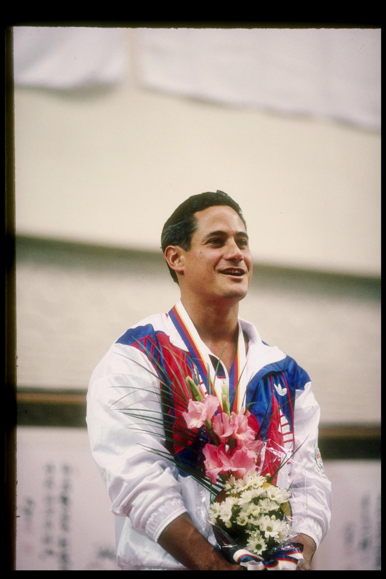 20 Sep 1988:  Greg Louganis of the United States celebrates during the Olympic Games in Seoul, South Korea. Mandatory Credit: Pascal Rondeau  /Allsport