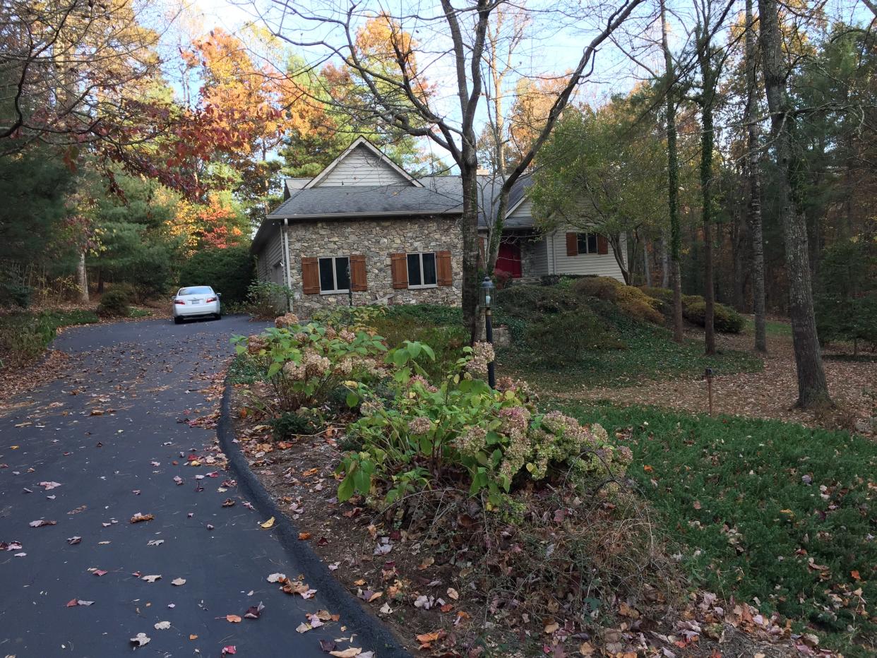 This is a photo of the driveway leading up to the Ballings home in Kenmure at 105 Maple Hill Drive.