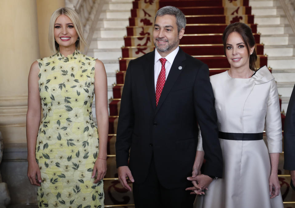 Ivanka Trump, President Donald Trump's daughter and White House adviser, Paraguay's President Mario Abdo Benitez and first lady Silvana Lopez Moreira, pose for photos at Presidential Palace in Asuncion, Paraguay, Friday, Sept. 6, 2019. Ivanka Trump is on her third stop of a South American trip to promote women's empowerment. (AP Photo/Jorge Saenz)