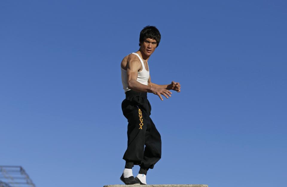 Abbas Alizada, who calls himself the Afghan Bruce Lee, poses for the media in Kabul