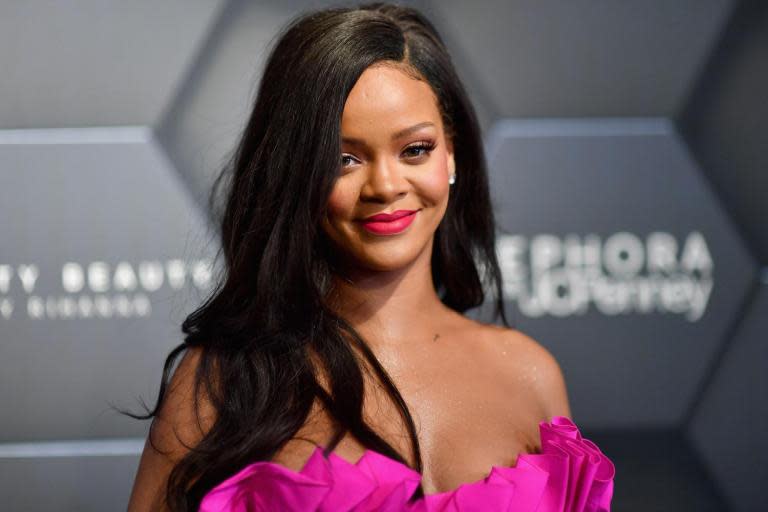 Rihanna sues her father for exploiting use of their last name