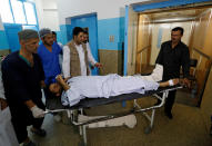 <p>An injured man is carried inside a hospital after a suicide attack in Kabul, Afghanistan, Aug. 29, 2017. (Photo: Mohammad Ismail/Reuters) </p>