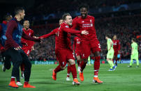 Divock Origi and Xherdan Shaqiri lead the celebrations as the former puts Liverpool ahead.