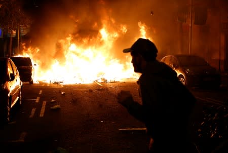 Separatists protest after a verdict in a trial over a banned Catalonia's independence referendum in Barcelona