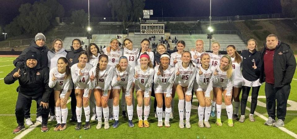 The Oaks Christian girls soccer team poses for a photo after defeating Calabasas 6-0 on Tuesday night to clinch the Marmonte League title. The Lions are 9-0 in league with one match remaining and 16-2-1 overall.