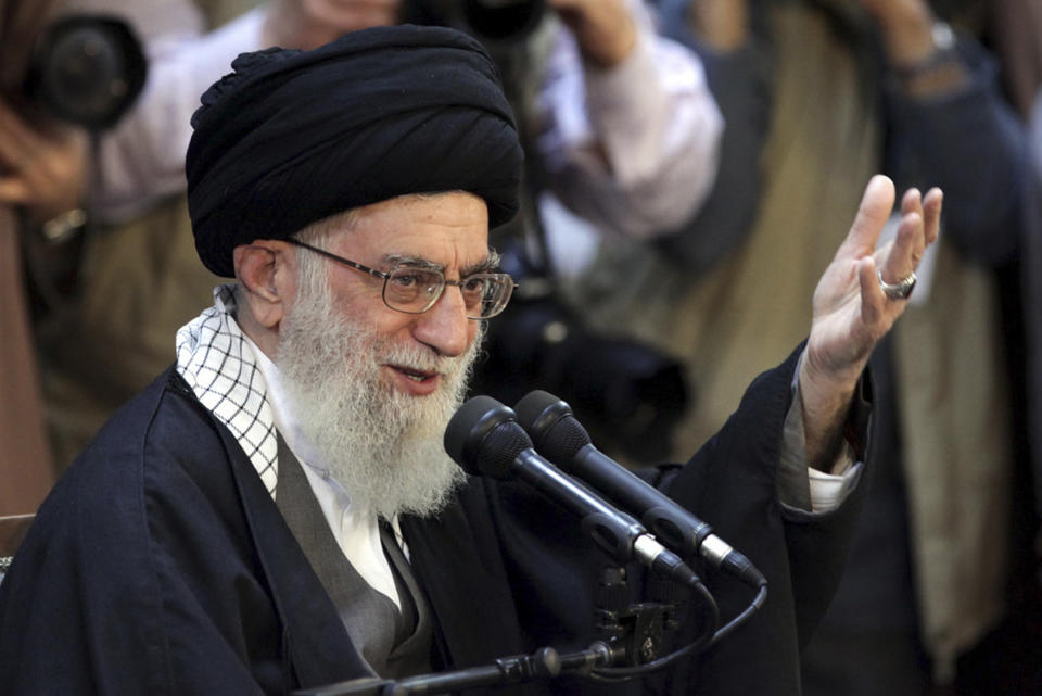 In this picture released by an official website of the office of the Iranian supreme leader, Supreme Leader Ayatollah Ali Khamenei, gives a speech at a public gathering in the city of Mashhad, Iran, Friday, March 21, 2014. Iran's top leader says his nation can best counter sanctions imposed by the West by strengthening its economy. Khamenei said Iranians should not wait for the sanctions to be lifted but work to build a stronger economy to "reduce vulnerability." (AP Photo/Office of the Iranian Supreme Leader)