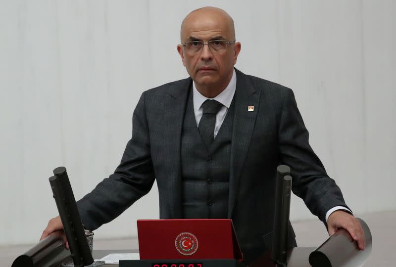 FILE PHOTO: Enis Berberoglu, the first lawmaker from the main opposition Republican People's Party jailed amid government purges following a failed military coup in 2016 and released from prison last month takes his oath at the Turkish parliament in Ankara