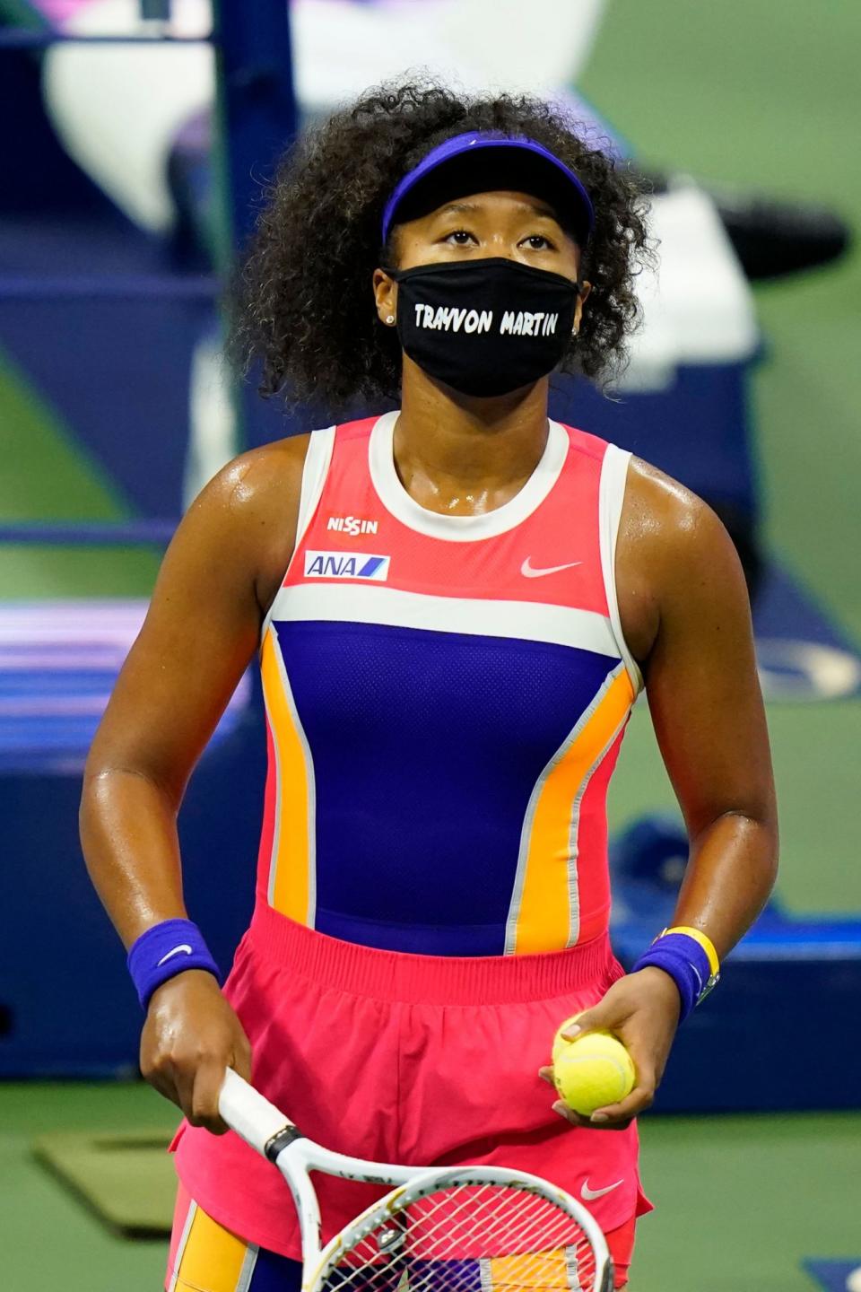 <p>Naomi Osaka continues to draw attention to <a href="https://people.com/sports/naomi-osaka-wears-ahmaud-arbery-mask-us-open-third-round/" rel="nofollow noopener" target="_blank" data-ylk="slk:racism and police brutality;elm:context_link;itc:0;sec:content-canvas" class="link ">racism and police brutality</a>, wearing a mask with Trayvon Martin’s name on it as she defeats Anett Kontaveit on Monday in New York City. </p>