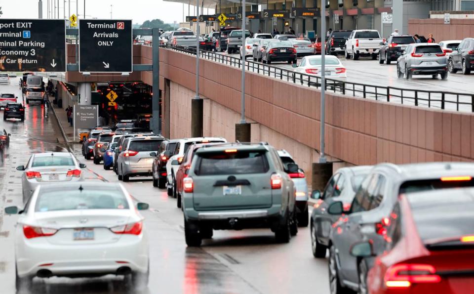 Vehicles line up to pick up passengers at Terminal 2 at Raleigh-Durham International Airport in Morrisville, N.C., early Friday evening, May 17, 2024.