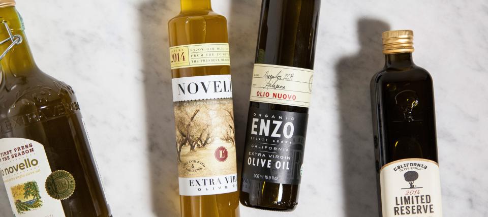 <h1 class="title">olive oil bottles on marble background</h1><cite class="credit">Photo by David Cicconi</cite>