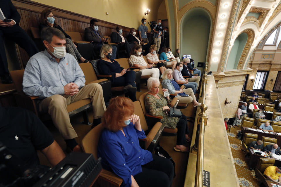 Social protocol is maintained as observers watch the House consider a number of bills Saturday morning, June 27, 2020 at the Capitol in Jackson, Miss. Mississippi lawmakers could vote to remove the Confederate battle emblem from the state flag. The symbol has come under criticism amid nationwide protests against racial injustice. (AP Photo/Rogelio V. Solis)