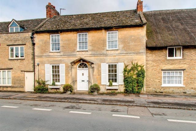 The double-fronted house in Bampton.