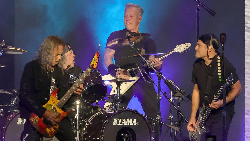 Guitarist Kirk Hammett, drummer Lars Ulrich, frontman James Hetfield and bassist Robert Trujillo of Metallica perform at Allegiant Stadium on February 25, 2022 in Las Vegas, Nevada.