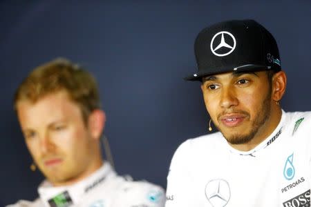 Formula One - Grand Prix of Austria - Spielberg, Austria - 2/7/16 - Mercedes Formula One drivers Nico Rosberg of Germany and Lewis Hamilton of Britain during a news conference. REUTERS/Dominic Ebenbichler