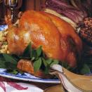 This recipe comes from the November 1988 issue and is part of our Thanksgiving Hall of Fame series. This large turkey will serve 16. If you have a smaller group, there will be plenty of leftovers to enjoy over the next few days. <a href="https://www.bonappetit.com/recipe/roast-turkey-with-sausage-and-apple-stuffing-and-pan-gravy?mbid=synd_yahoo_rss" rel="nofollow noopener" target="_blank" data-ylk="slk:See recipe.;elm:context_link;itc:0;sec:content-canvas" class="link ">See recipe.</a>