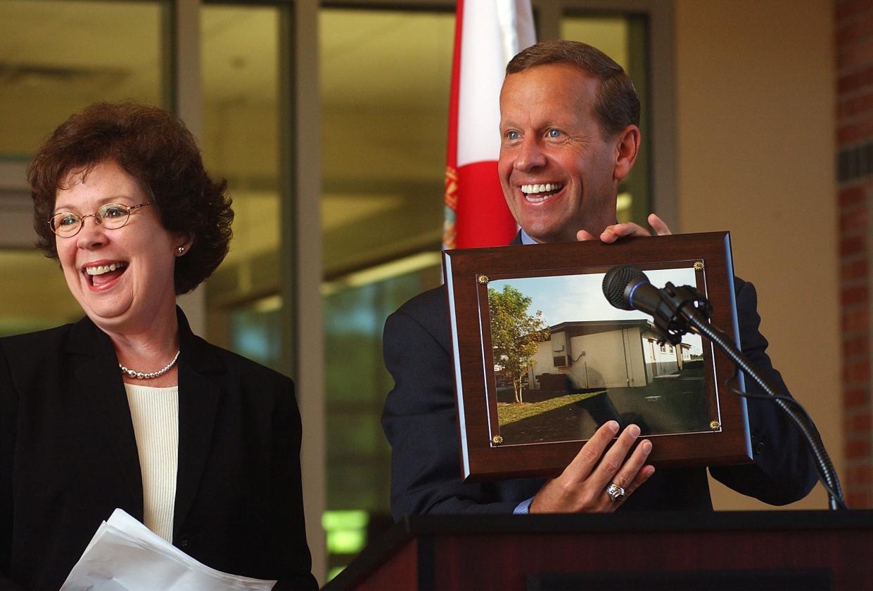 Two superintendents of Martin County schools who set a high bar for academic achievement are shown in the file image. On Nov. 12, 2003, Sarah Wilcox, left, the superintendent, presented new Florida Atlantic University President Frank Brogan with a picture of his first classroom, a 200-square-foot portable at Port Salerno Elementary School, during his inauguration as fifth president of FAU on the Treasure Coast Campus in Port St. Lucie.