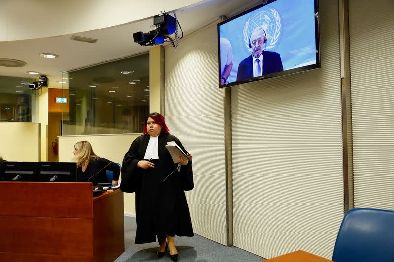 Franko "Frenki" Simatovic appears on a screen in court, in The Hague