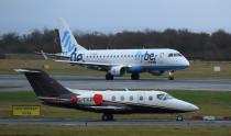 A Flybe plane takes off from Manchester Airport in Manchester, Britain